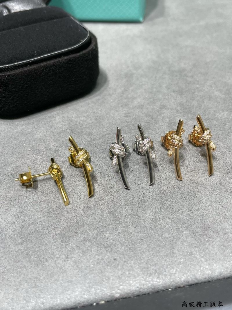 T*f*ny earrings